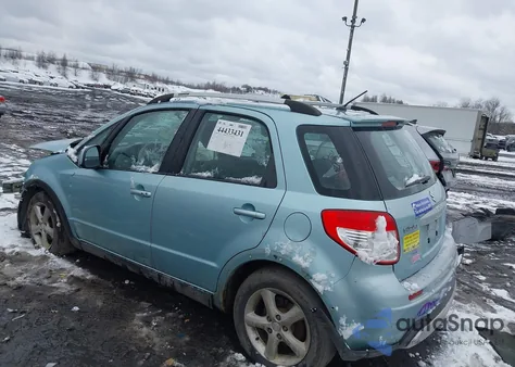 2009 Suzuki Sx4 Touring z USA, uszkodzony, nr VIN JS2YB417996200634